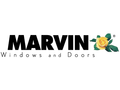 A yellow rose is shown in the dark.